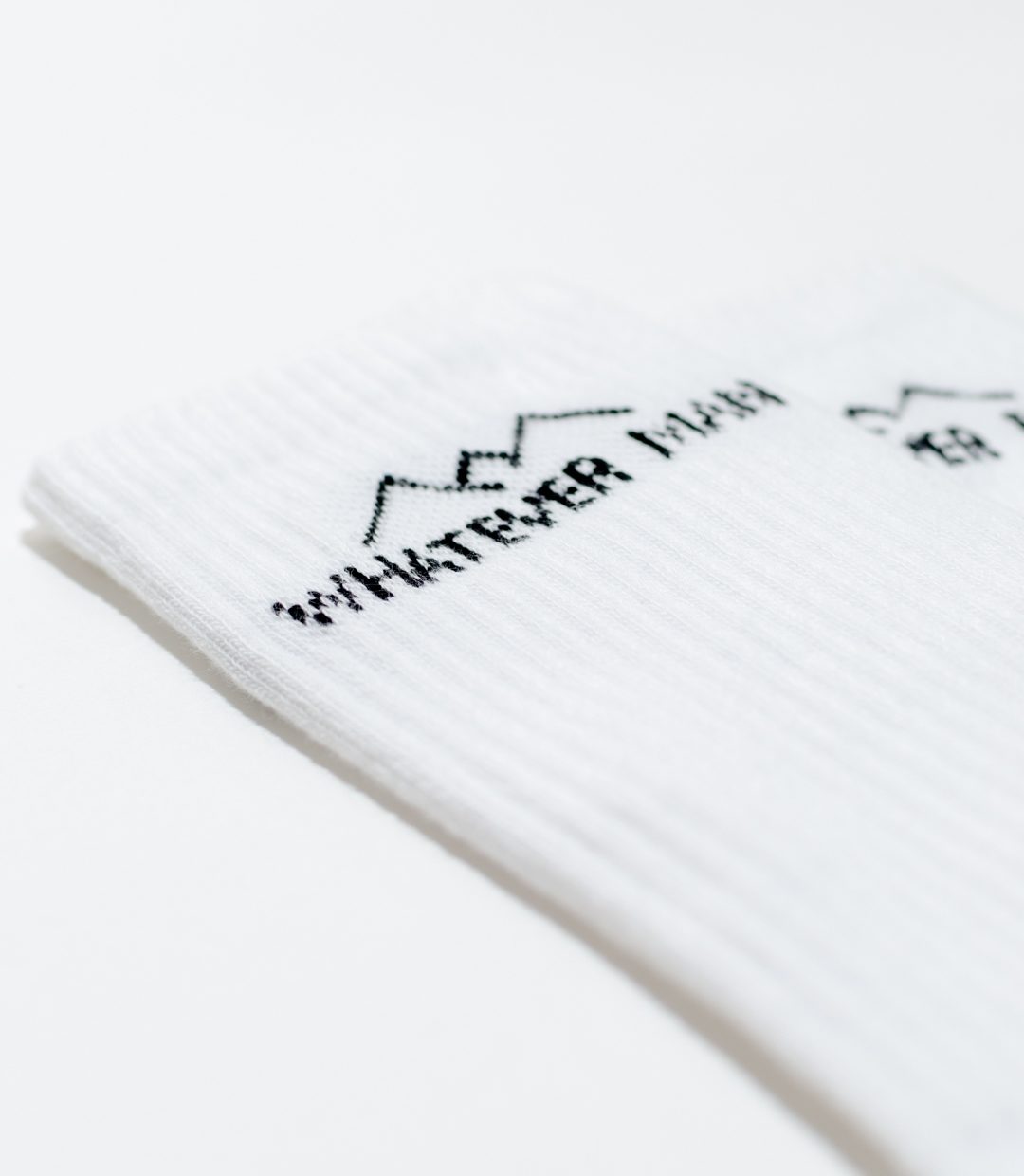Whatever Man Sock Logo white 2